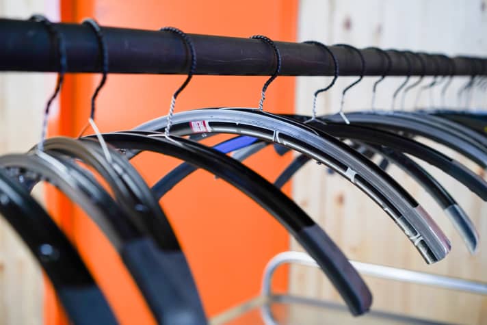   Rims in a former life - reborn as coat hooks after "death" on the testing machine.