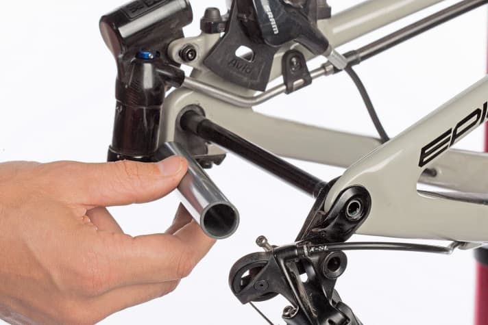   Tip two: If the bag does not have a thru-axle mount, screw the axles back into the frame anyway. Tubes cut to size from the DIY store give the frame and fork additional stability.