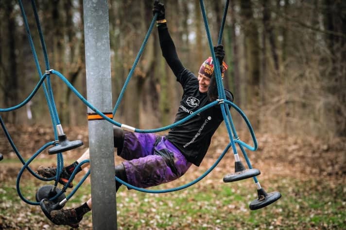   In a spider's web of ropes