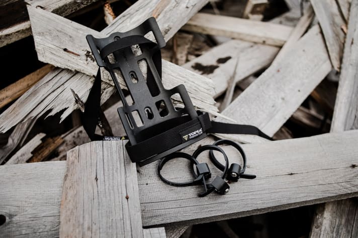   The Versa-Cage from Topeak is versatile in terms of loading and mounting options.