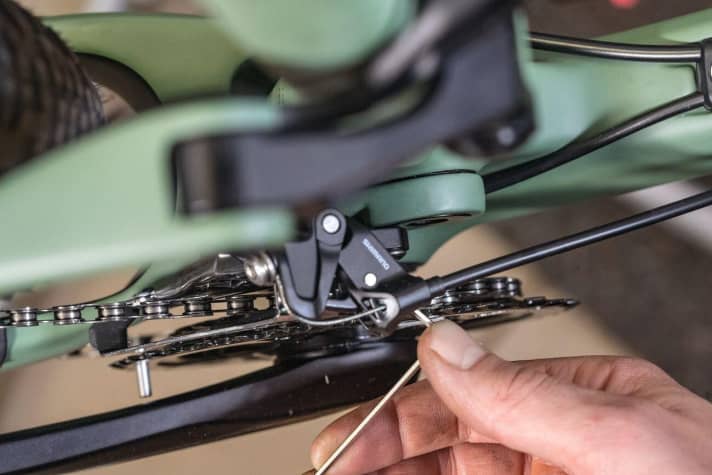 If the end stops of the front derailleur are perfectly adjusted, nothing should grind, the chain should change chainrings quickly when shifting and should not fall off.