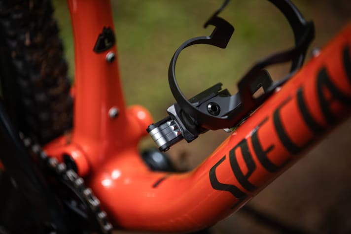   Specialized hides the mini-tool in a small plastic holder at the bottom of the bottle cage.