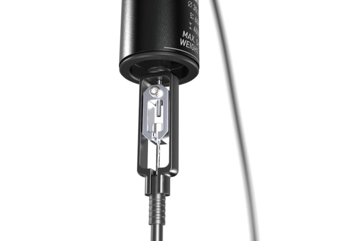   The quick-release fastener makes it easy to release the remote control cable.