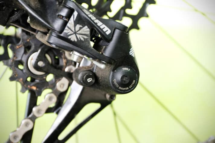   The friction damper in the rear derailleur keeps the chain in check and prevents chain slap. The latest evolutionary stage of the system is called Type 3 at Sram.