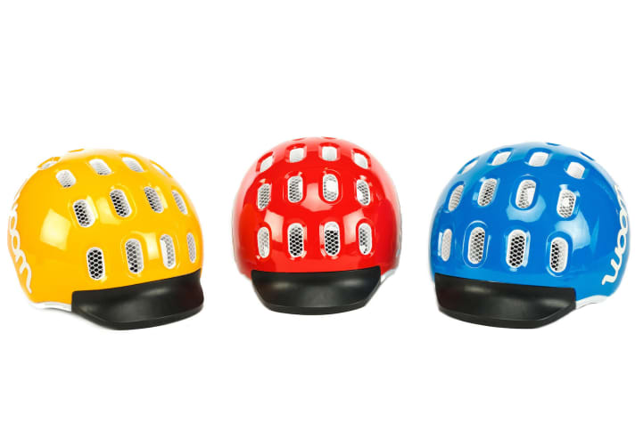 AWARD WINNER - woom KIDS HELMET Manufacturer: woom - Jury Statement: In our opinion, if a product for children is to be successful, it has to look good. Thanks to its cheerful colours, this helmet has definitely succeeded. A practical detail is the visor made of rubber materials for additional protection.