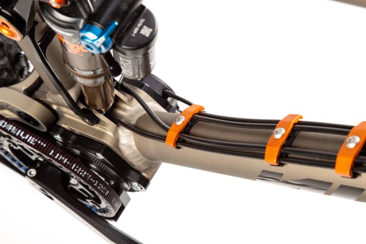   Nicolai installs the continuous cables on the outside of the down tube for easy servicing.