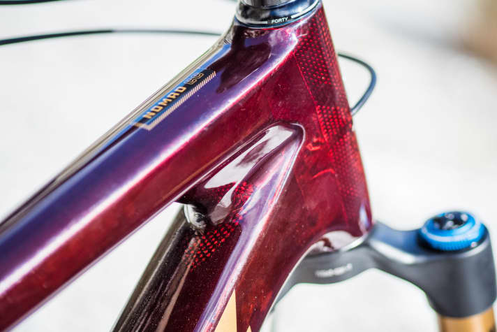   The Oxblood paintwork is semi-transparent and reveals the carbon fibre mats.
