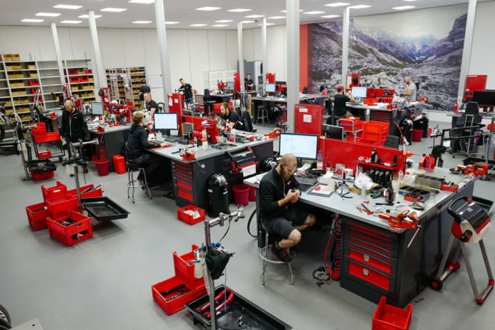   In the DSD area, which stands for Dealer Service Direct, employees wait for parts that have been sent in while answering questions from the hotline via headset.