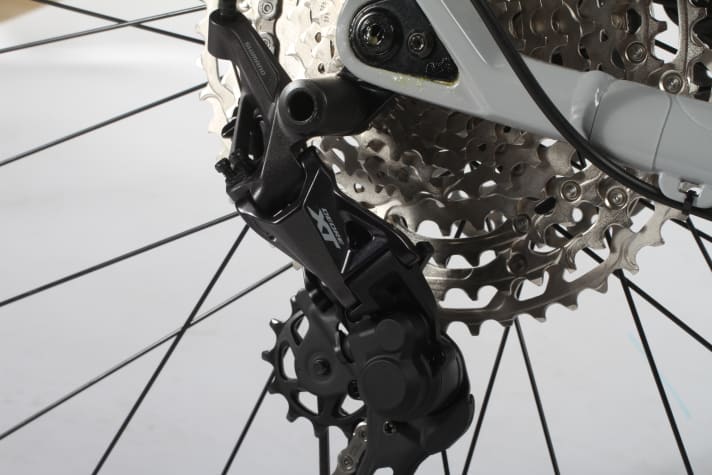   The gears are shifted by a Shimano XT rear derailleur, the shifters and chain come from the SLX groupset and the 10-51 cassette is from the Deore range.