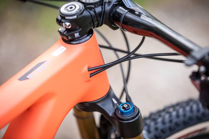   The cables run inside the frame.