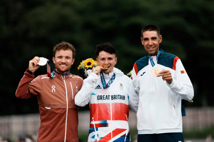   Gold for Pidcock (centre), silver for Switzerland's Flückiger (left) and bronze for the 1.89 metre tall David Valero from Spain.