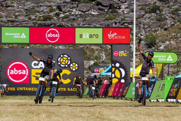   At the front Urs Huber (right) and Simon Schneller celebrate the stage win, at the back Martin Frey sprints away from Jordan Sarrou and secures second place for Team Bulls.