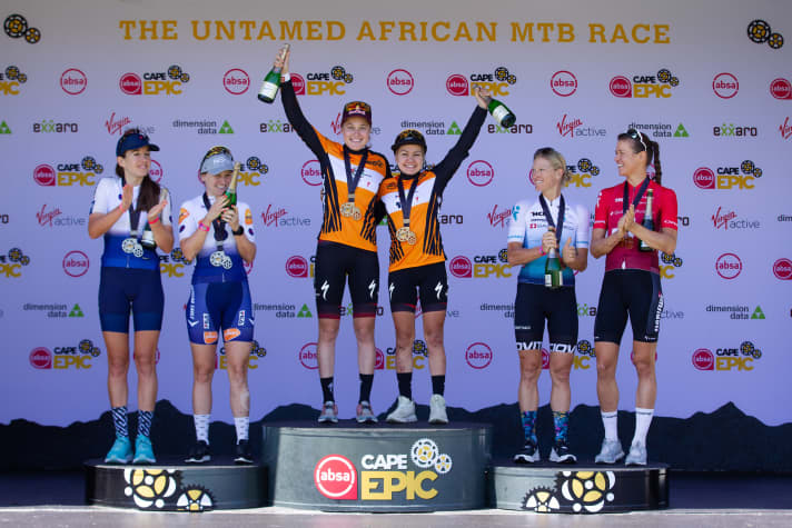   The youngest at the top: The women's podium at the Cape Epic 2021 with Faces CST, NinetyOne-Songo-Specialised and Salusmed.