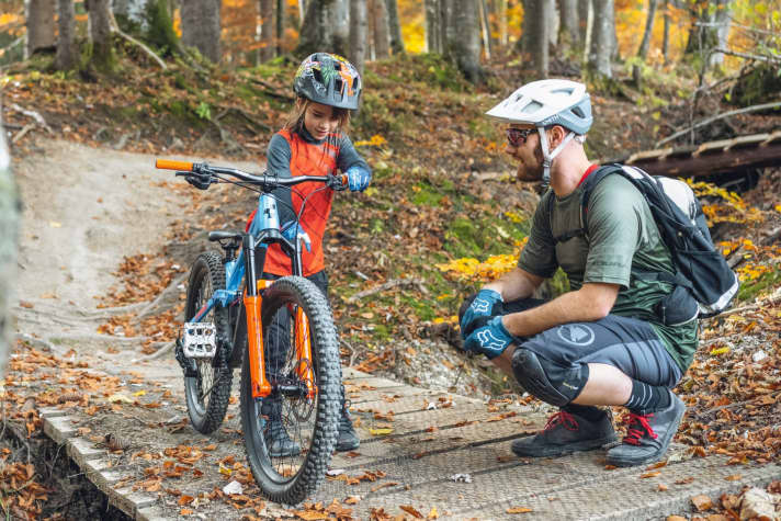 Discussing mountain biking experiences together results in valuable experiences and learning moments for children.