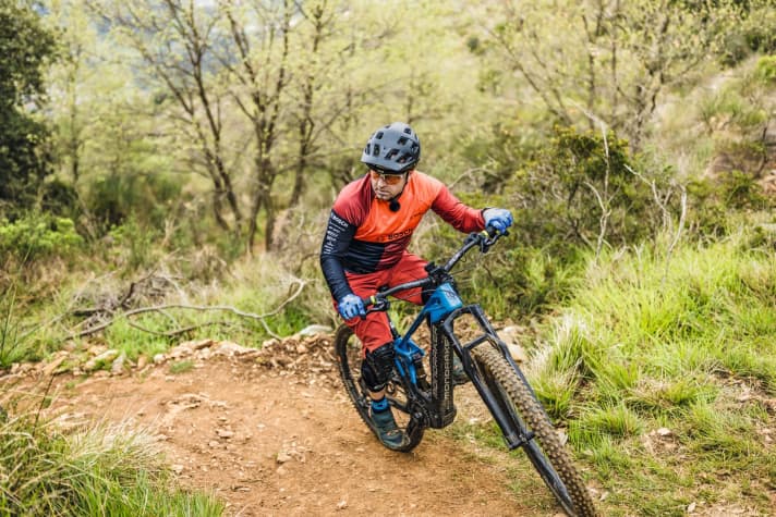   During the entire manoeuvre, your eyes scan the terrain to avoid or be prepared for minor obstacles. Maybe there's a step after the bend that you can't see before - or even hikers?