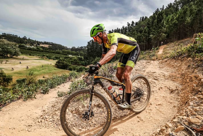   Ergo team rider Elmar Sprink at the Cape Epic 2022 - testing the GXR bike grips on the side. 