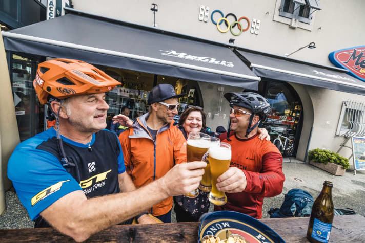 A toast to a successful uphill adventure with Mary at Mecki's Bar.