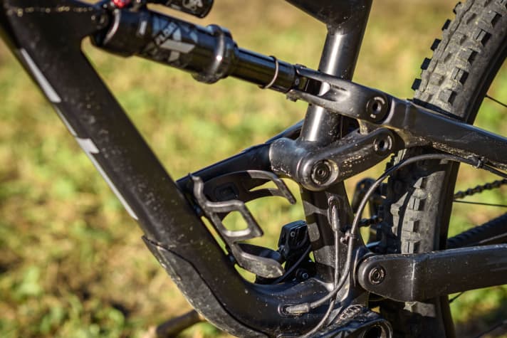 The asymmetrical frame creates space for a water bottle - but only provides 153 millimetres of rear suspension travel.