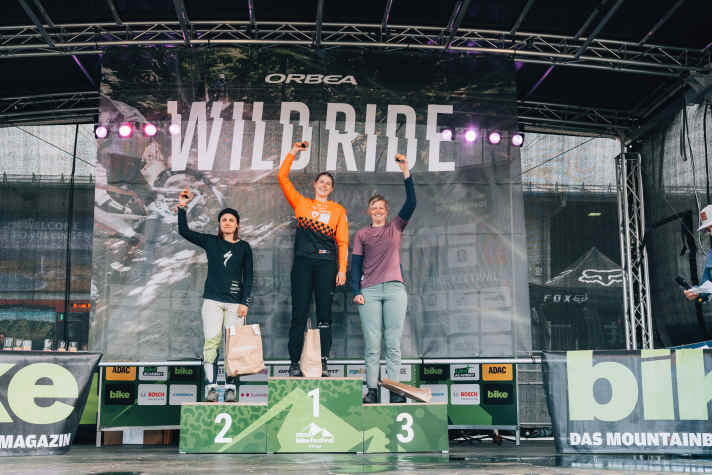 Helen Weber beaming at the top of the podium