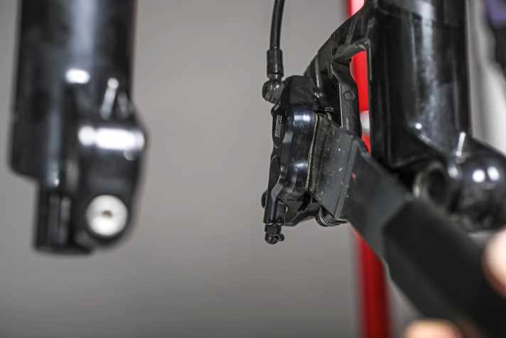 With the brake pads inserted and the appropriate tool, press the brake pistons back into the housing. Repeat several times if necessary.