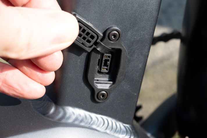 Not confidence-inspiring: the fiddly cover of the small charging socket.