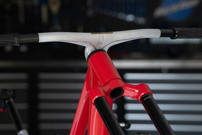 The brake lines run along the underside and are clicked into the open channels.