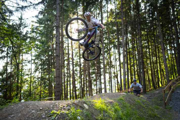Biker jumps over a table in Obermillstatt