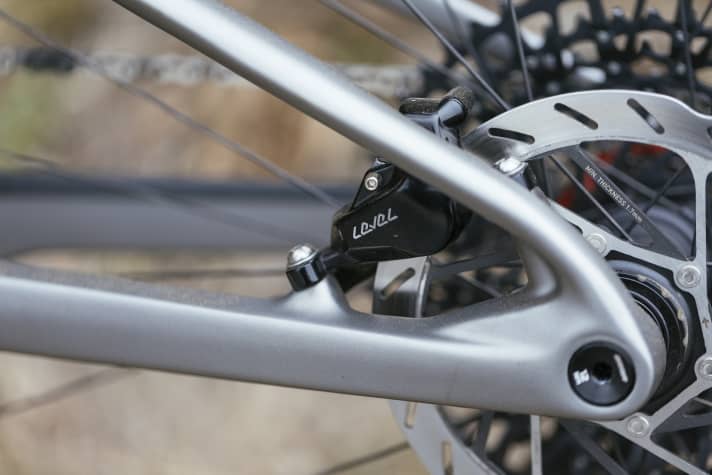 The post mount brake calliper of the rear brake is well protected behind the seat stay on the Berria Mako.