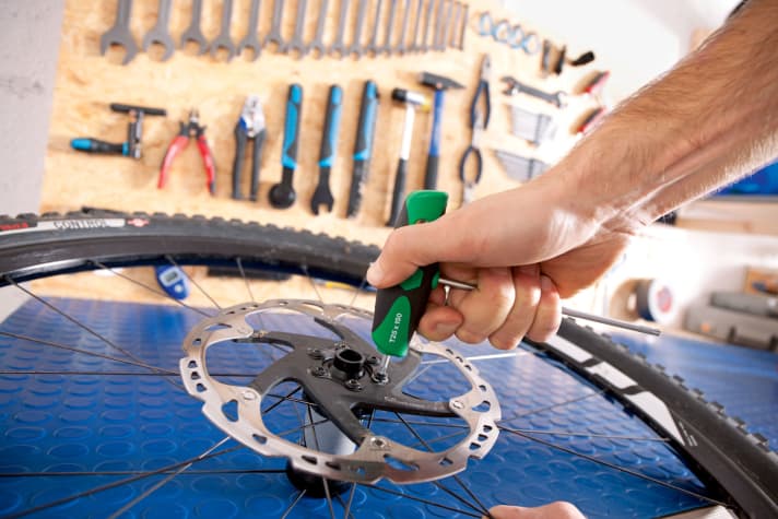 The workbench is the centrepiece of the bike workshop.