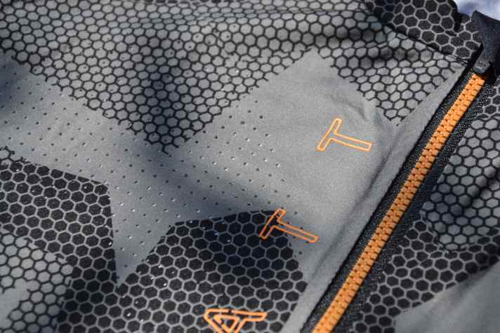 Laser-cut perforations – alongside the breathable fabric – ...