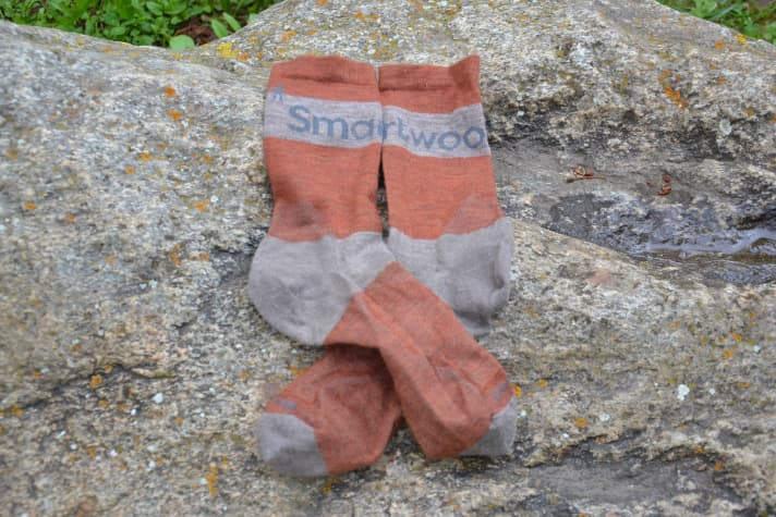 Without ironing (which you shouldn't do with merino socks) they are no longer smooth. But they are very comfortable to wear.
