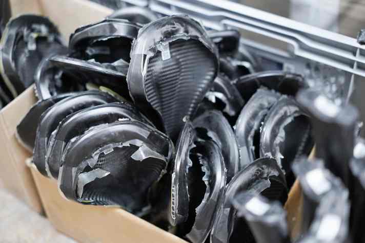 Carbon parts (here still with resin edges before finishing) do not require any special care and can be very durable.