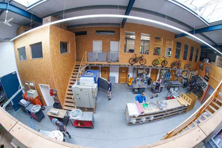 The aluminium moulds are the linchpin of production. They are kept at the heart of the company. On the outside: milestone bikes in carbon history.