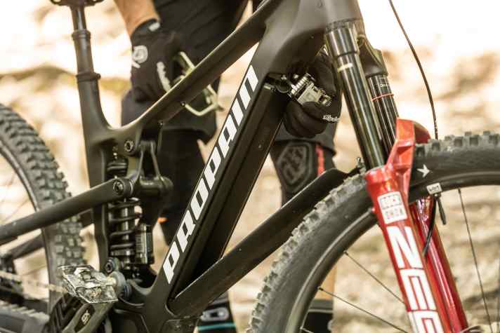 The battery is unlocked using an Allen key and can be quickly and easily folded out of the down tube.