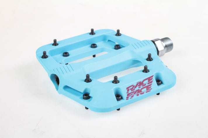 Flat pedals made of plastic, such as the Race Face Chester shown here, are attractively priced and available in many colours.