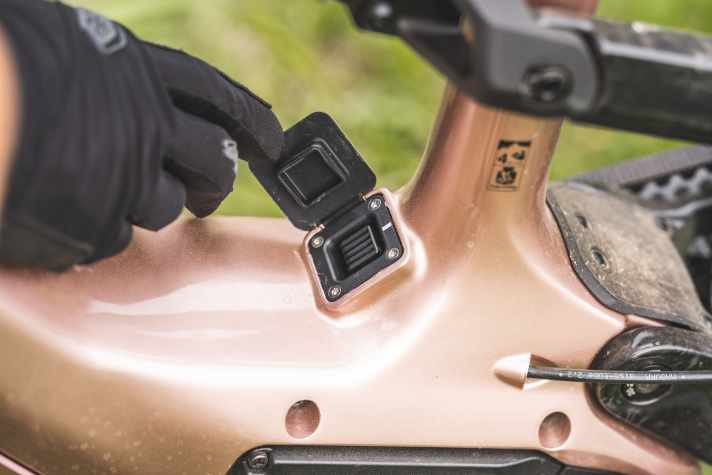 The charging port for the battery is sealed with a rubber flap.