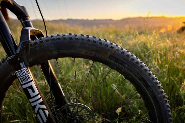 WTB combines flat centre lugs for fast rolling with grippy and soft outer lugs.