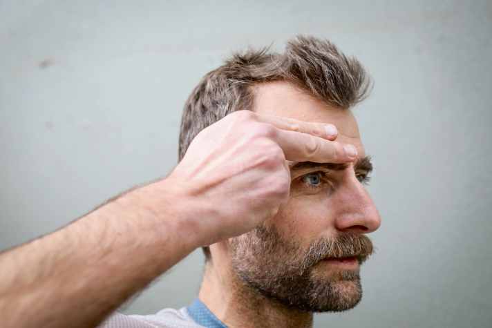 Take your measurements correctly: place the measuring tape two fingers wide above the eyebrow