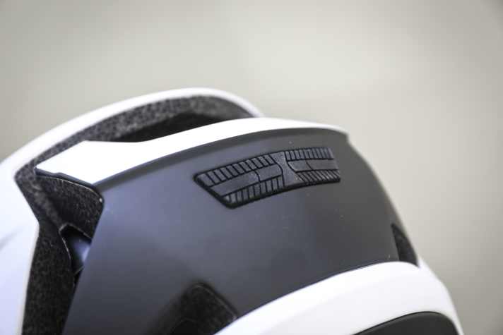 To prevent the goggle from slipping off the helmet, it is held in place by a rubber coating on the back