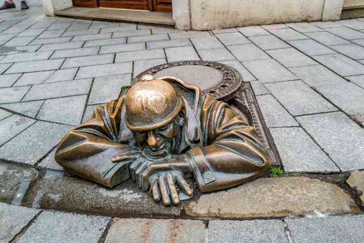Bronze figures such as "Cumil" can often be found in Bratislava's old town centre.