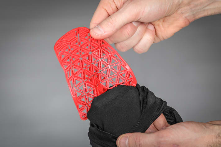 The small pad of the Leatt really only covers the knee area. It can be removed for washing