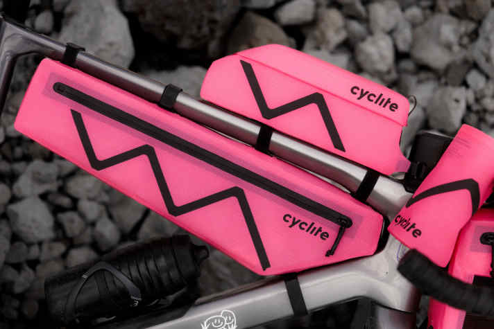 Six bikepacking bags in the Pink Rush Edition. A limited edition range available from 8 July 2026, featuring weatherproof, ultra-lightweight models.