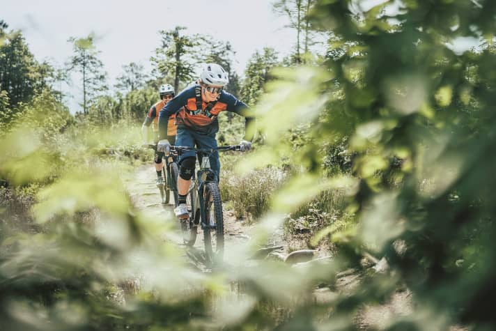 You don't actually need electronics to talk to each other here. Even with the latest communication systems, bike buddies have to stay within range or in the mobile phone network.