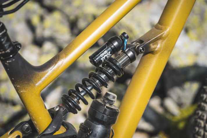 The Fox DHX steel spring shock in the Specialized Status 1702 offers a platform lever for pedalling.