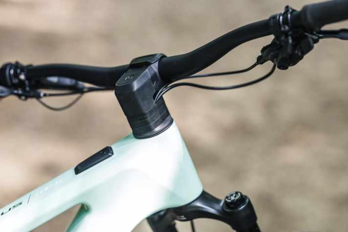 The cables run along the specially designed stem, through the headset and into the frame.