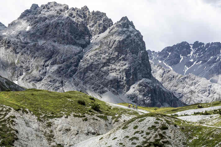 In front of these rock faces, even the biggest marathon bikers seem tiny.