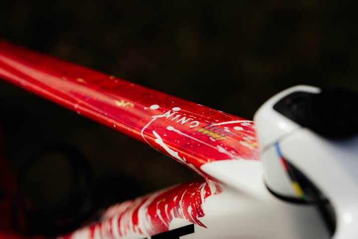 Rainbow colours for 10-time world champion Nino Schurter.