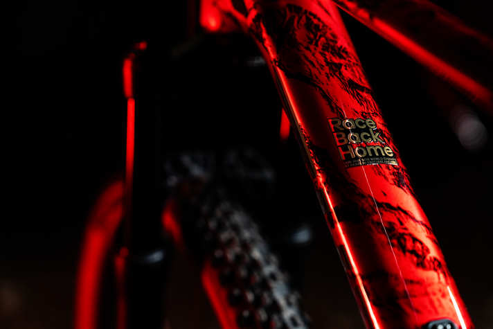 Race Back Home - should mean something like: Race at home, at home