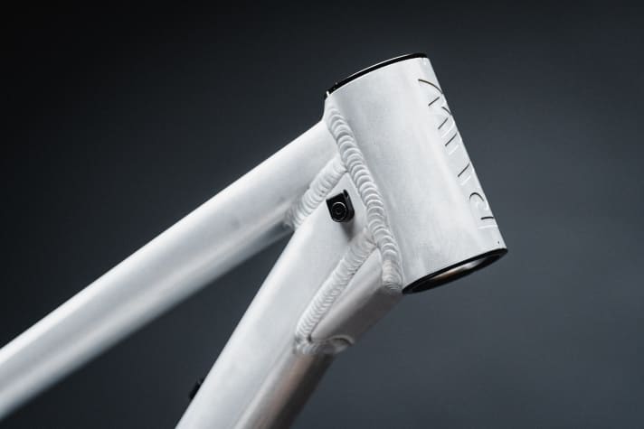 The head tube of the Raaw Madonna V3 not only fits an angled headset, but also a double bridge fork.