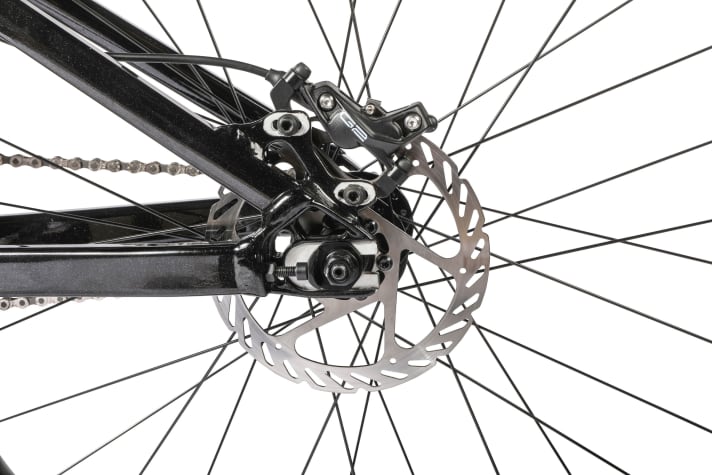 Rocky Mountain relies on horizontal dropouts and slotted holes to move the brake calliper.